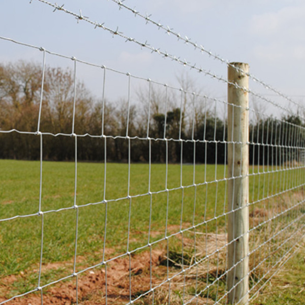 adding barbed wire to chain link fence